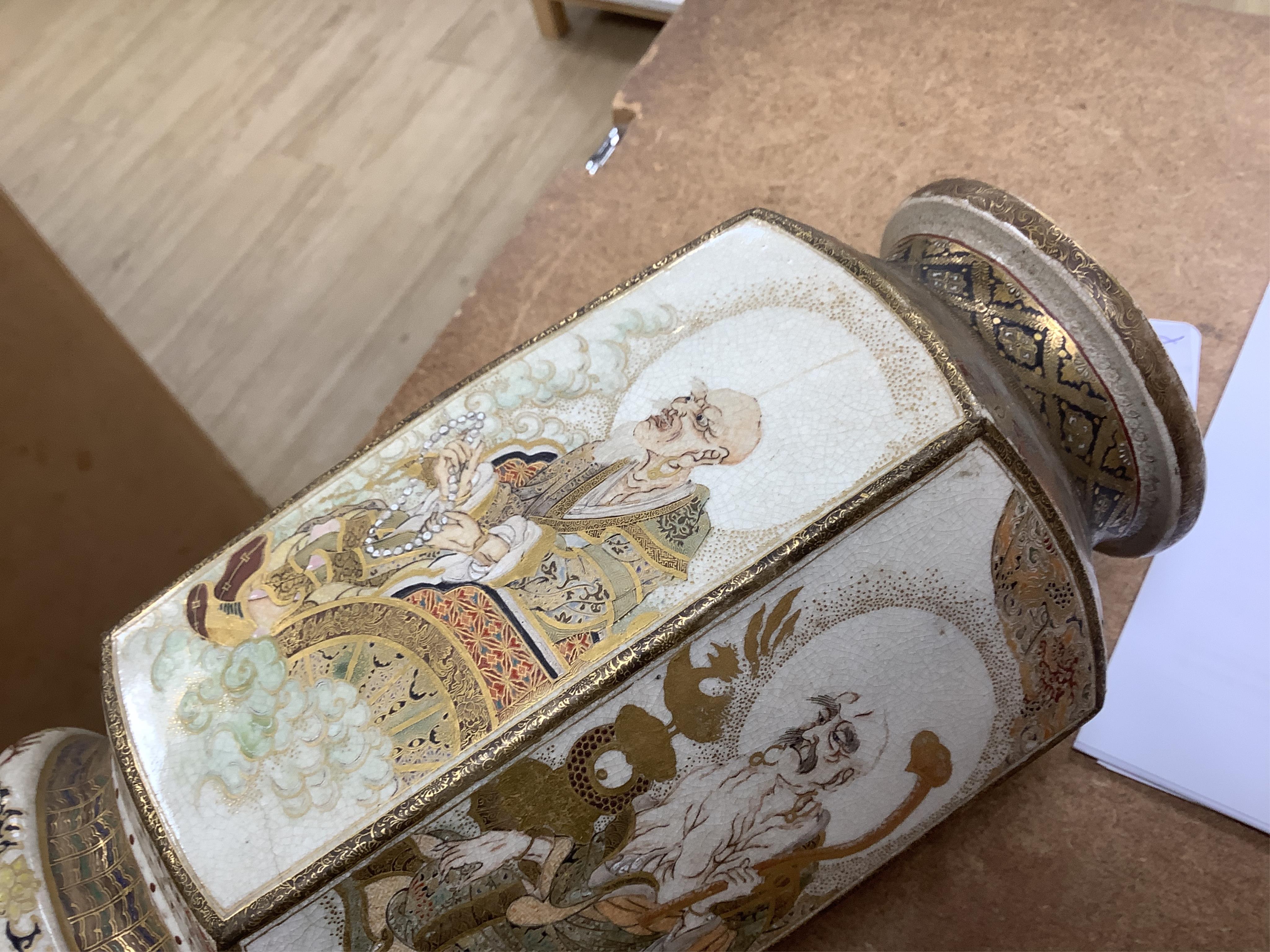 A pair of Japanese Satsuma 'rakan' vases, Meiji period, 26cm high
